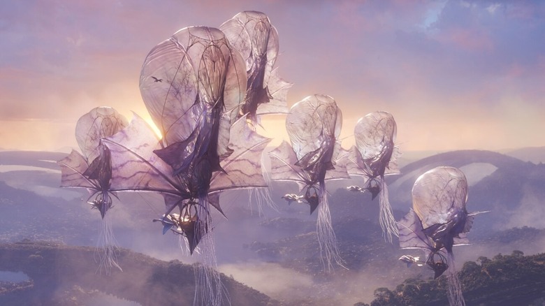 Na'vi airships floating over the forests of Pandora at dawn in "Avatar: Fire and Ash" (2025)