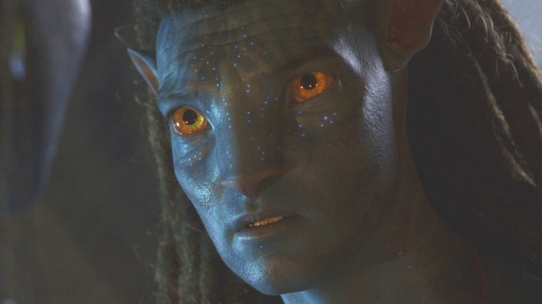 Jake Sully looking concerned in Avatar: The Way of Water