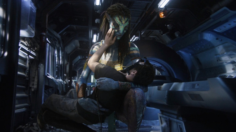 Neytiri comforting Jake Sully