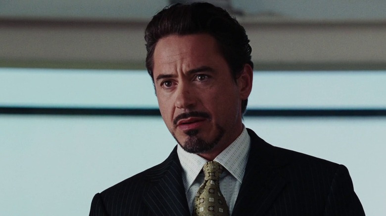 Tony Stark giving a press conference in Iron Man
