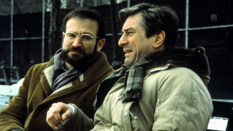 Dr. Sayer and Leonard sit on a bench in "Awakenings" (1990)