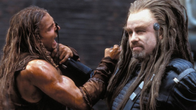 Terl holding up Jonnie Goodboy Tyler in "Battlefield Earth" (2000)