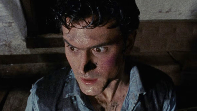 Ash looking scared in The Evil Dead (1981)