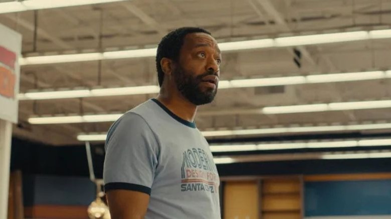 Clark wearing a Modernist Design Forum t-shirt in Backrooms (2026)
