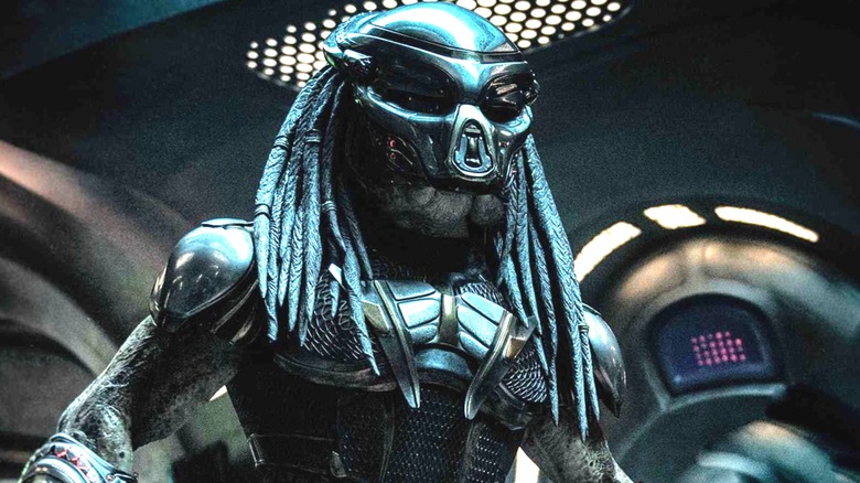 Yautja wearing futuristic mask