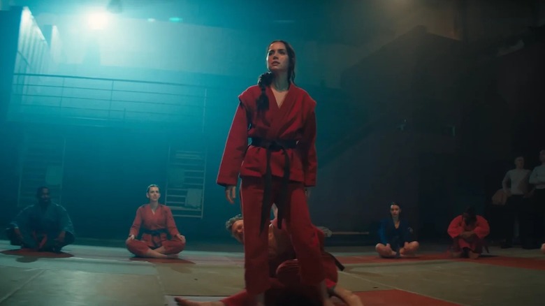 Eve Macarro standing victorious after a training session