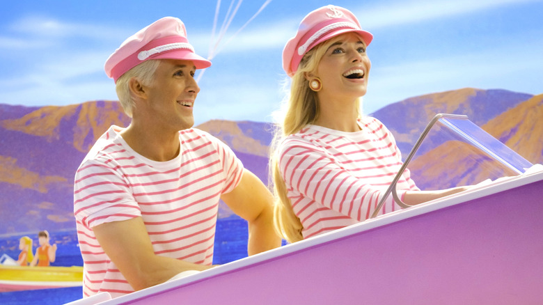 Barbie and Ken ride a boat together