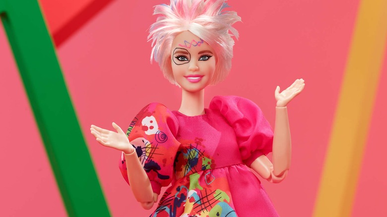 Weird Barbie raising her hands