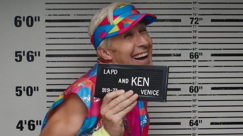 Ken poses for mugshot