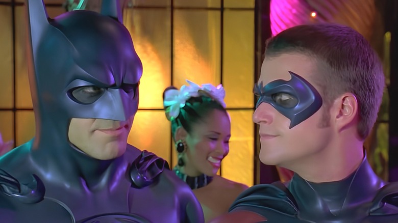Robin smirks at Batman