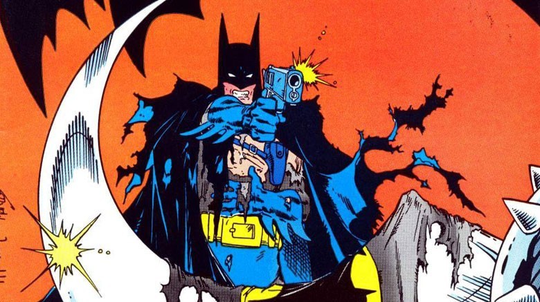 Batman firing a gun