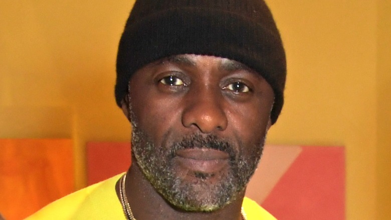 Idris Elba in black knit cap