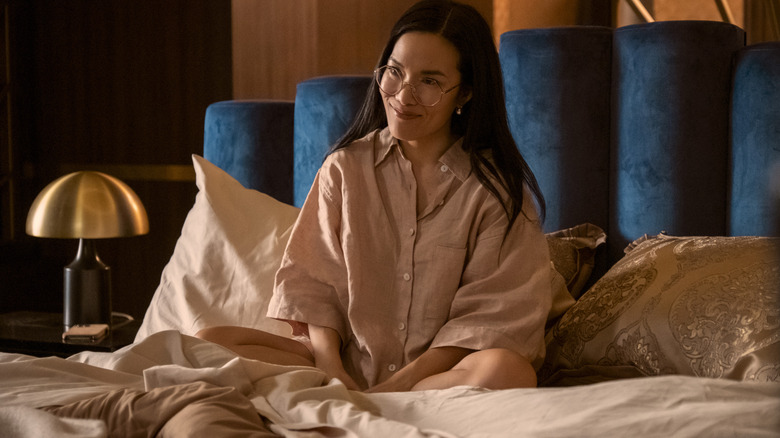 Amy sitting in bed