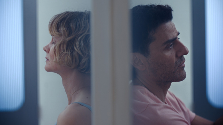 Lindsay and Josh sitting back-to-back