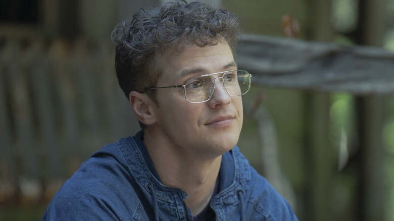 Adrian Chase smiling in 