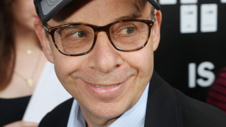 Rick Moranis grinning in 2017