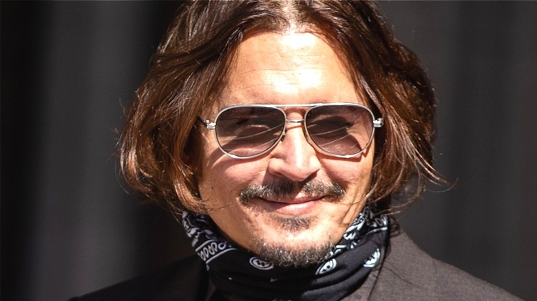 Johnny Depp smirk glasses