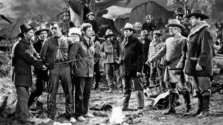 A group of townsfolks debating over a lynching in "The Ox-Bow Incident" (1943)