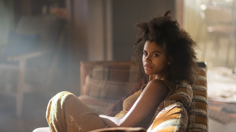 Emma sitting on couch Nine Days movie