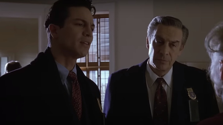 Curtis and Briscoe interview a witness