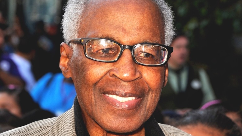 Robert Guillaume wearing glasses and smiling