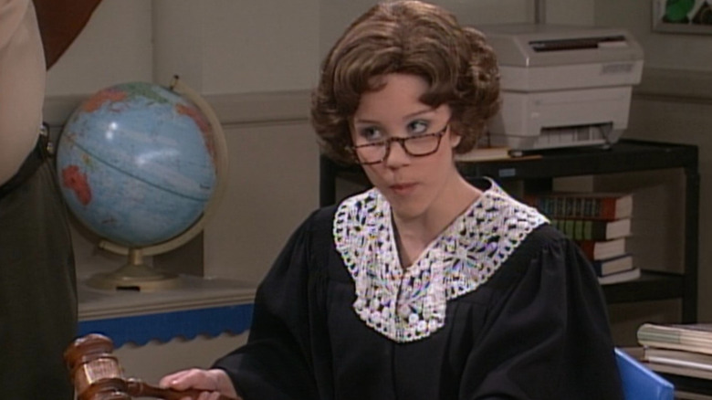 Judge Trudy sitting in a classroom on The Amanda Show