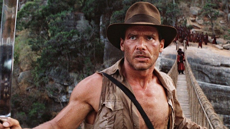 Indiana Jones gets cornered on a rope bridge in The Temple of Doom