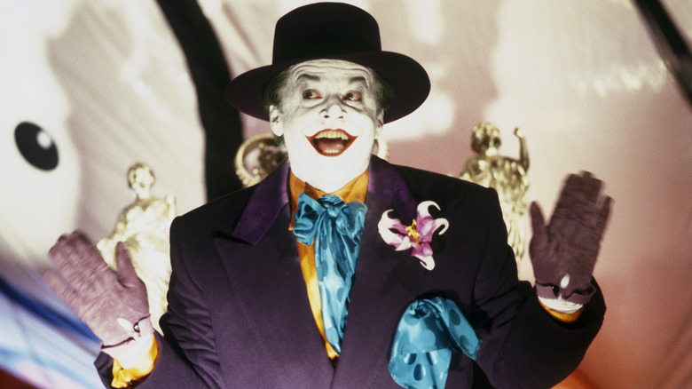 The Joker greeting Gotham citizens on a parade float