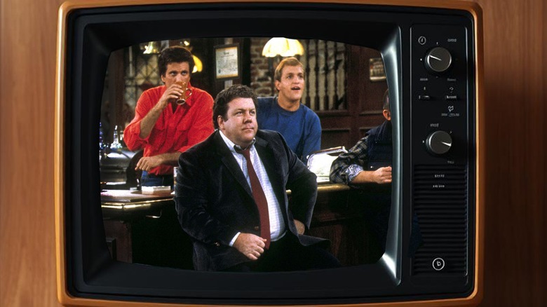 Cliff, Norm, Woody, and Sam watching television at the bar in 