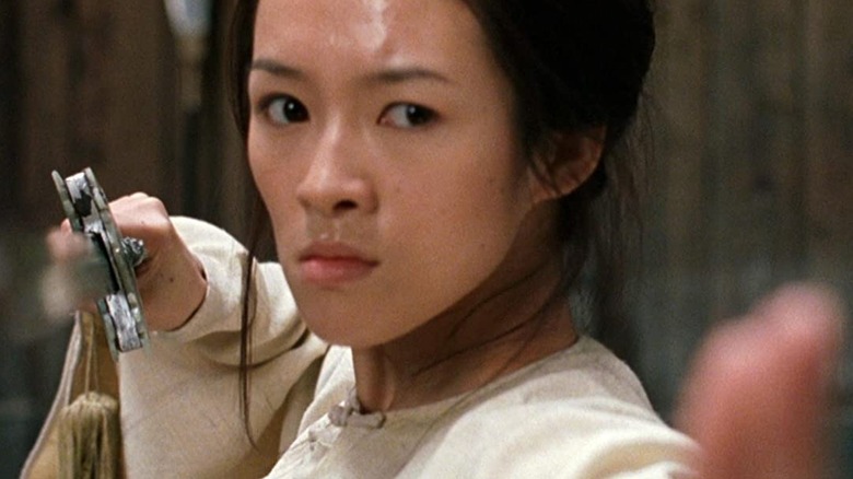 Jen Yu brandishing a sword