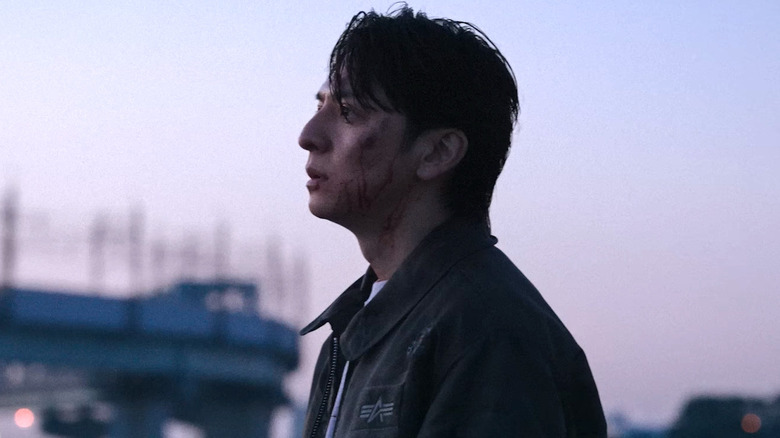 Shuhei Sakata staring into the distance in Demon City