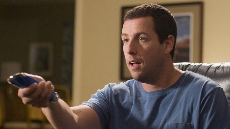 Michael Newman works the remote control