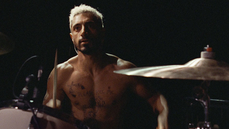 Ruben drumming shirtless in Sound of Metal