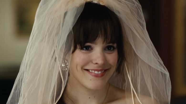Paige Collins smiles in wedding veil
