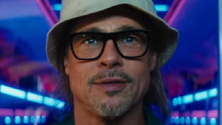 Brad Pitt in glasses and bucket hat