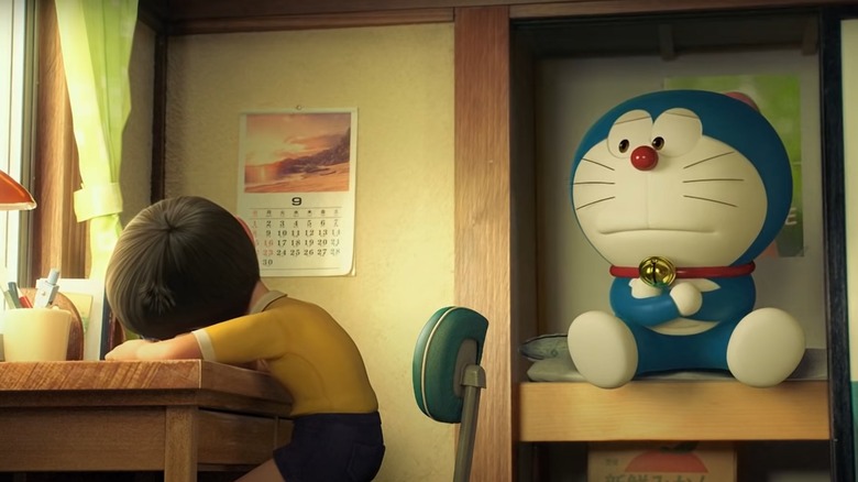 Doraemon sitting with arms crossed, looking at Nobita