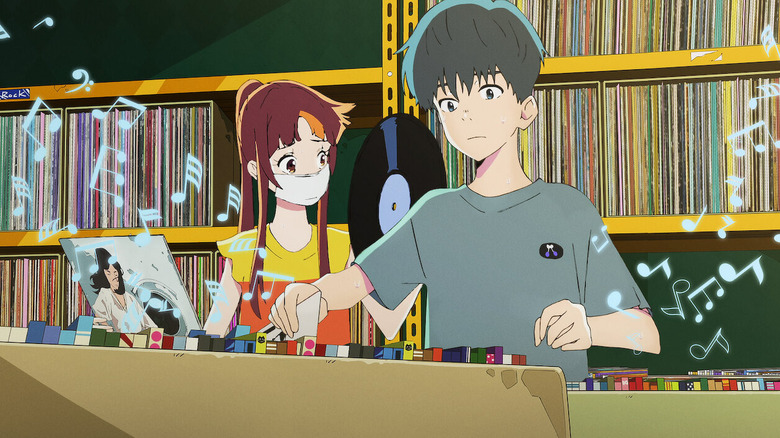 Cherry and Smile look through a record store