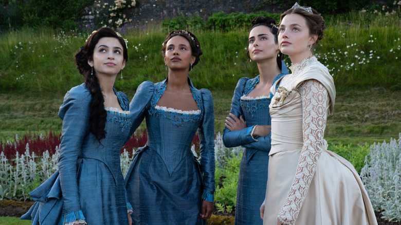 Mabel Conchita Lizzy and Nan looking up at something in gowns on The Buccaneers