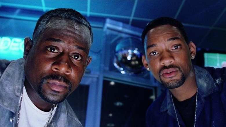 Burnett and Lowrey looking at camera