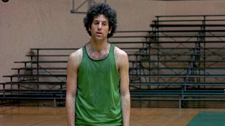 Hector Bloom stands on a basketball court in "Drive, He Said" (1971)