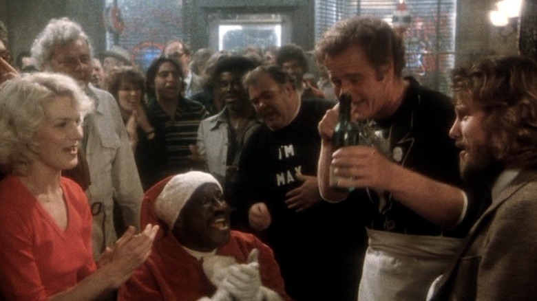 Roary and Louise celebrate Christmas in a bar in "Inside Moves" (1980)