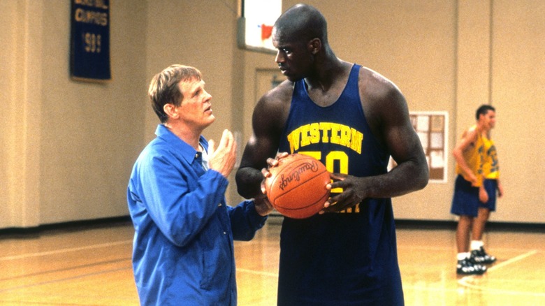 Coach Pete Bell talks to one of his players in "Blue Chips" (1994)