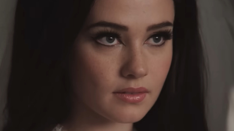 Cailee Spaeny as Priscilla Presley on her wedding d ay in 