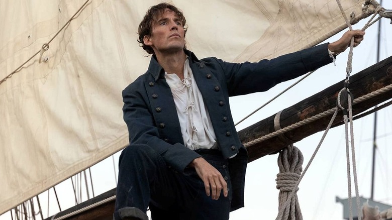 Edmond looking out to sea from a ship in The Count of Monte Cristo