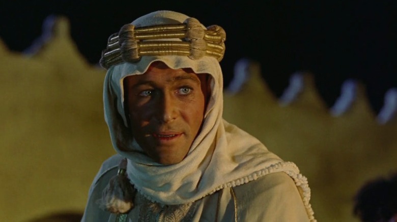 T. E. Lawrence looking to his left and speaking in Lawrence of Arabia
