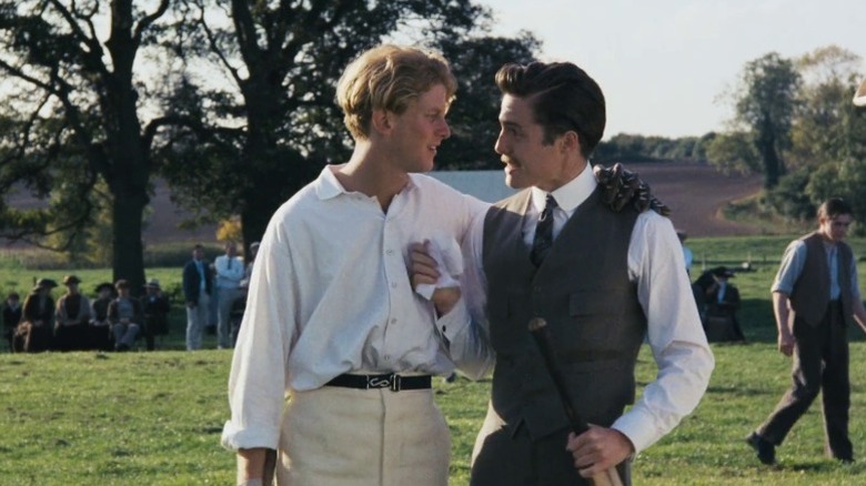 Maurice walking with his arm around Clive in Maurice