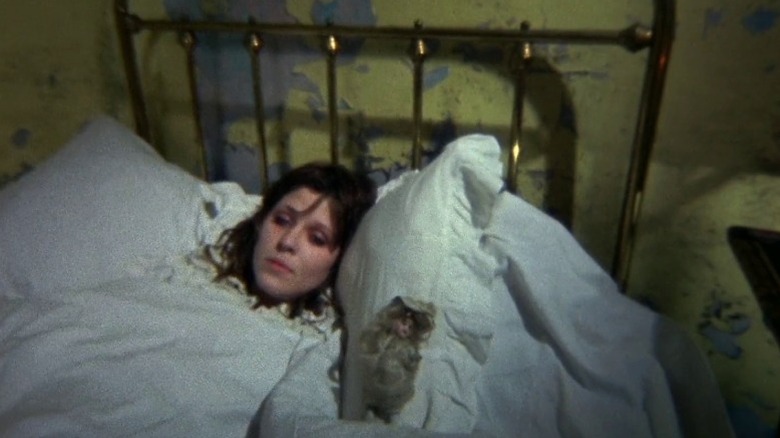 Meg lying in bed and staring into nothing in The Other Side of the Underneath