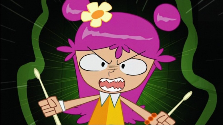 Ami holding drum sticks on Hi Hi Puffy AmiYumi