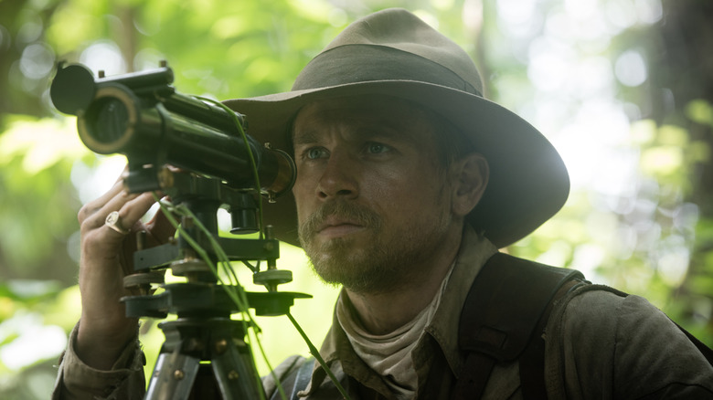 Percy Fawcett surveys  in "The Lost City of Z" (2016)