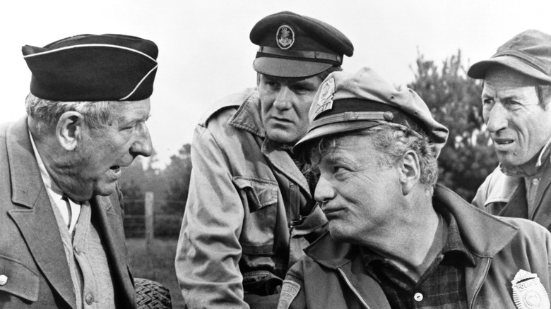 Link Mattocks, Fendall Hawkins, Lester Tilly, and Oscar Maxwell talking in 'The Russians Are Coming! The Russians Are Coming!' (1966)